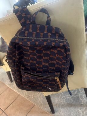 Herschel Supply Company navy backpack with brown logo print